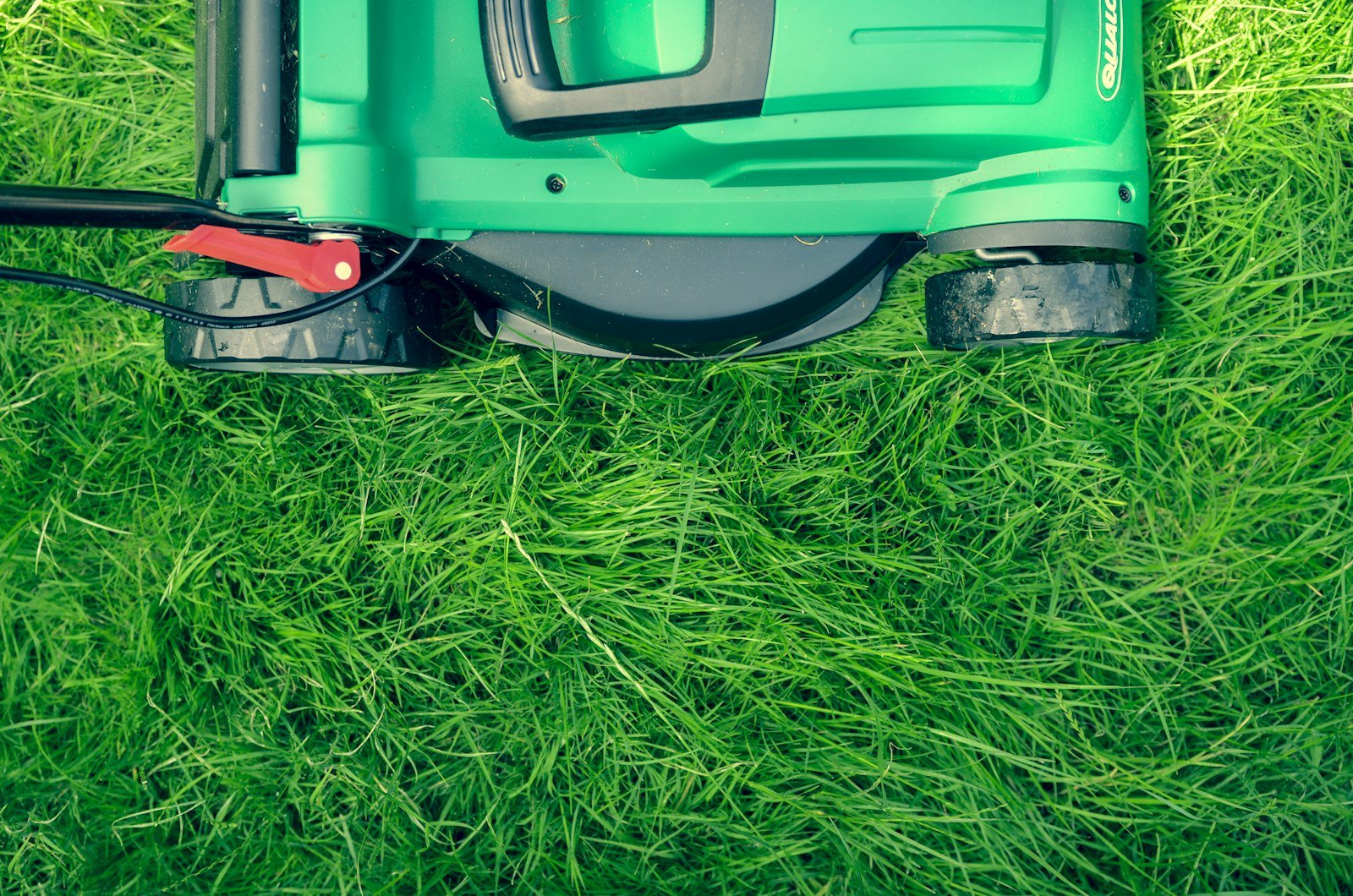 Lawn mower on grass